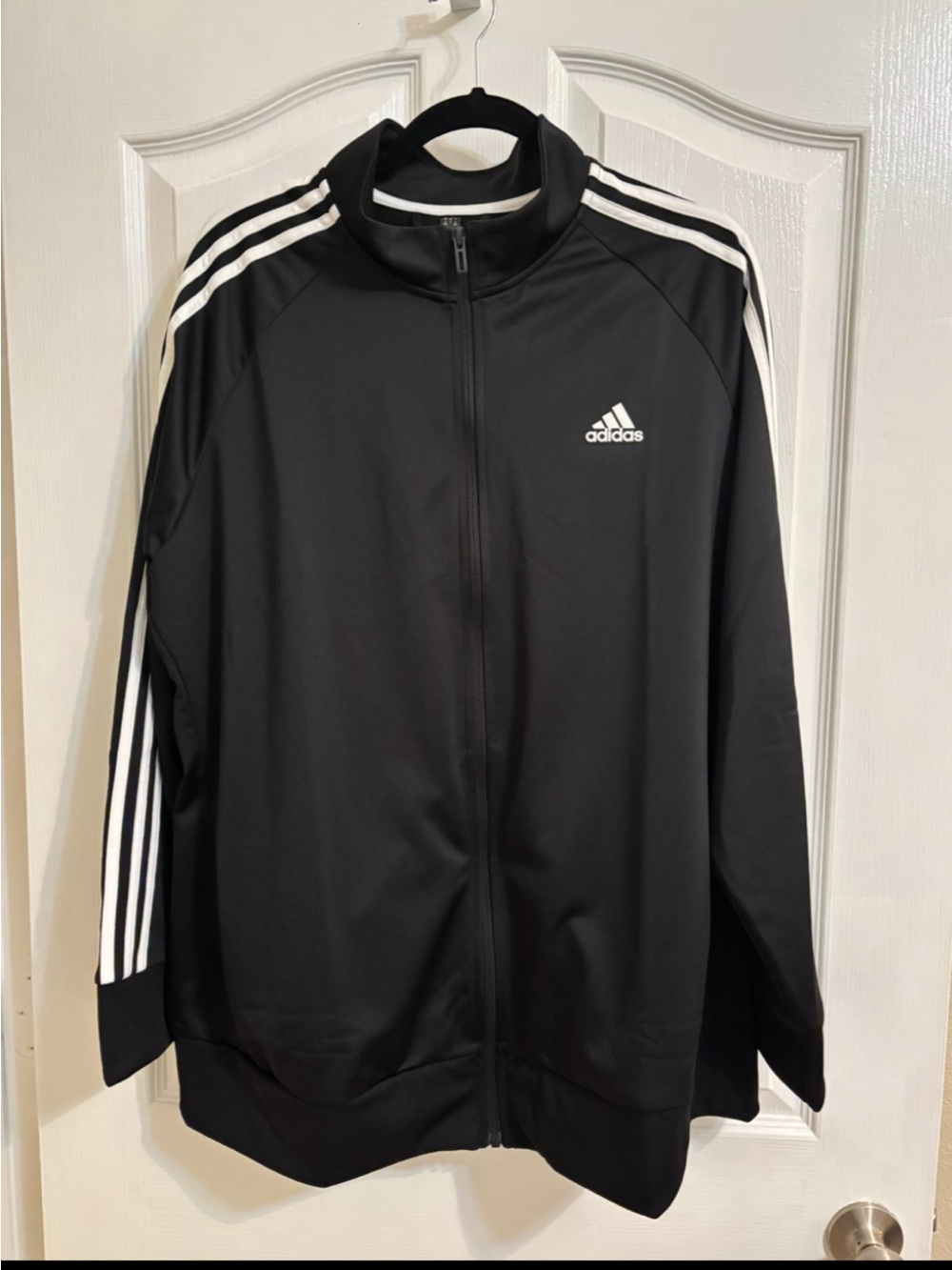 Adidas women’s Black Track Jacket with Signature Stripes